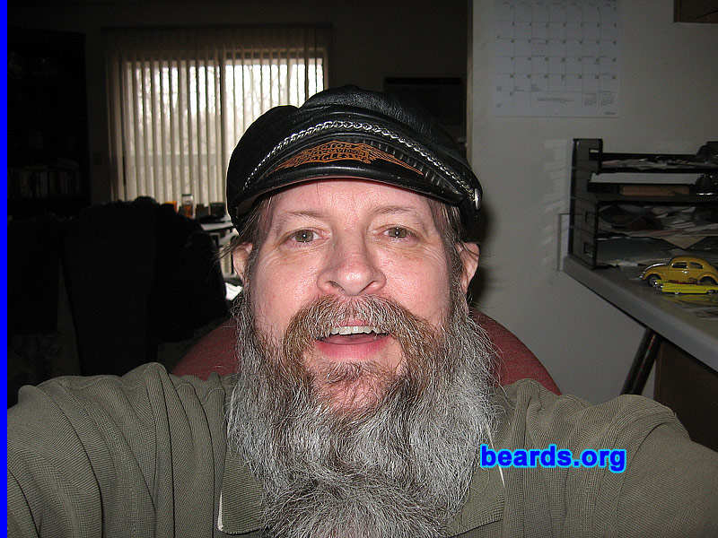 John
Bearded since: 1993. I am a dedicated, permanent beard grower.

Comments:
I changed jobs in 1992 from one where I couldn't have a beard to one where I could.  So I started growing one, not thinking it would become as bushy as it has.

How do I feel about my beard? I like my beard and I think beards enhance not only a man's face but his personality, as well. The beard seems to have increased my self-confidence.
Keywords: full_beard
