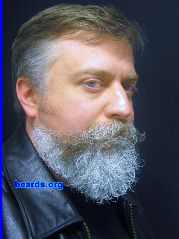 Mark
Bearded since: 1985.  I am a dedicated, permanent beard grower.

Comments:
I grew my beard because I like the way I look with a beard.

How do I feel about my beard? I used to have a trimmed beard, but the past few months I've been letting it grow. The longer and fuller it gets, the more I like it.
Keywords: goatee_mustache extended_goatee