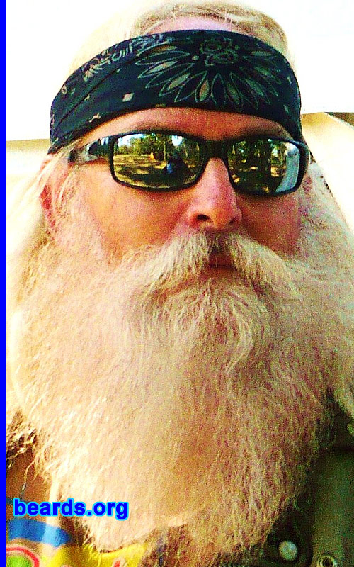 Rickey M.
Bearded since: 1982. I am a dedicated, permanent beard grower.

Comments:
I grew my beard because I could not shave every day.

How do I feel about my beard?  Great (Santa).
Keywords: full_beard