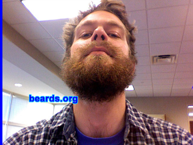 Andrew
Bearded since: 2010. I am an experimental beard grower.

Comments:
I wanted to grow a beard because it has become sort of a right of passage in my family. My great grandfather, Reginald, wore a beard; my grandfather, Lamont, fought the Great American War wearing a beard; and my father, Brutus, has been wearing a beard for as long as I can remember. It was a necessary threshold that I needed to cross before truly becoming a man.

How do I feel about my beard?  I am happy with the general heft and shape of my beard. My beard maintains a hearty, consistent style while also contributing on a more practical level to the warmth of my face.
Keywords: full_beard