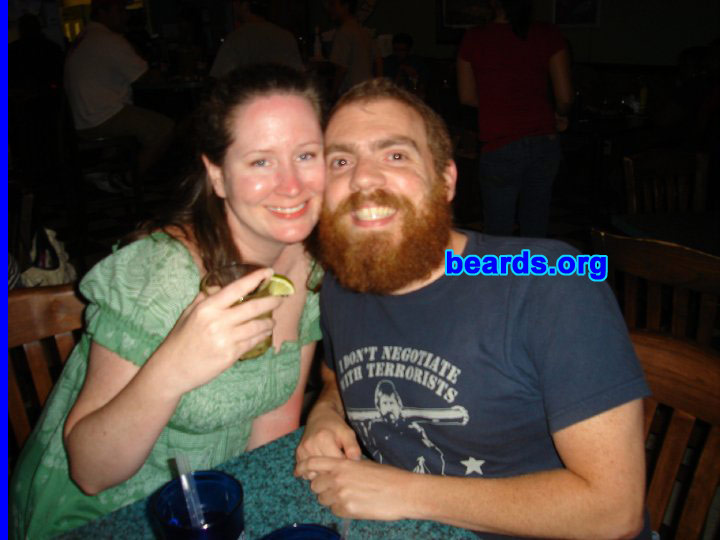 Brandon
Bearded since: 2008. I am a dedicated, permanent beard grower.

Comments:
I grew my beard because I loved Chuck Norris and Grizzly Adams as a kid! I'm starting to have less hair on my head.  So I'm making up for it with the amount of hair on my face!

How do I feel about my beard? I feel pretty great about my beard. My wife LOVES it! That's her with me in the photo. I'd like to see exactly how long it could get before I start teaching next year. I've always trimmed it to some degree over the past four years. I smell a summer project!
Keywords: full_beard