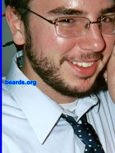 David
Bearded since: 2003. I am a dedicated, permanent beard grower.

Comments:
Why did I grow my beard?
Well, to be honest, it was just a matter of being lazy and not wanting to shave anymore. I'm pretty young -- 23 -- and I haven't been able to grow a beard or any kind of facial hair for very long. After the first week, I looked at my new facial hair, which wasn't much to be honest, and became curious. My friends all said that it looked silly, but I decided to got through with it, and after a month, I had a full beard. I'm very proud of it, and it's only gottten thicker and better looking after a year and a half.

How do I feel about my beard?
I'm very proud of my facial hair. It gives me something to do when I'm thinking or just bored, and it loves to be scratched. All my friends say that it makes me look more handsome and mature. I never had a very strong chin, but my beard makes my jaw seem more substantial and well-rounded. 
Keywords: full_beard