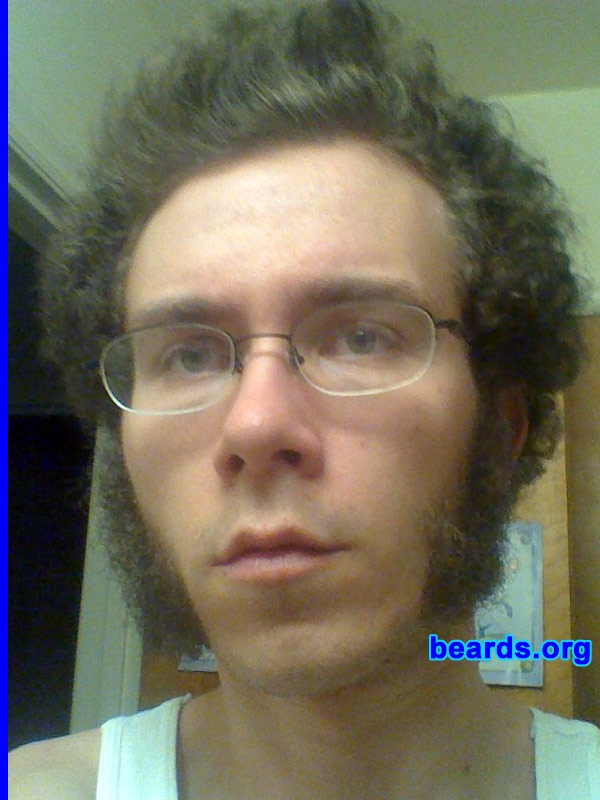 Josh
Bearded since: 2000.  I am a dedicated, permanent beard grower.

Comments:
When I was thirteen or fourteen I was so desperate for sideburns that I began to pull the hair from my head down onto my face by my ears. Luckily for me, I began growing facial hair soon thereafter and have never looked back. My particular facial hair stands out in the androgynous crowd of modern men and I feel that it perfectly reflects who I am.

How do I feel about my beard? I may have reached the end of my search for perfect sideburns. My jaw is quite long, so I don't want to grow my chops all the way to my chin and I'm surprised by how much I enjoy the box-like style that results. As a high school English teacher I love my students' bizarre responses to my facial hair -- they now call me "Wolverine."
Keywords: mutton_chops