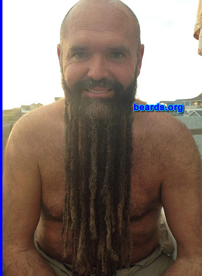Samuel
Bearded since: 2009. I am a dedicated, permanent beard grower.

Comments:
Why did I grow my beard? My boys dared me to.  It grew so fast I decided to put dreads in it!

How do I feel about my beard? I love it.  It gets me a lot of attention!
Keywords: full_beard