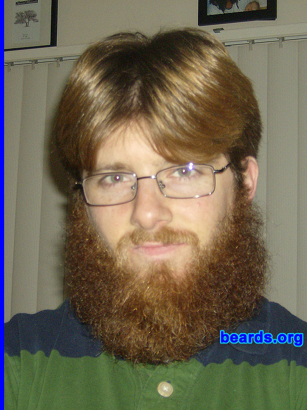 Brandon S.
Bearded since: 2000.  I am a dedicated, permanent beard grower.

Comments:
As a youth, I looked forward to the day when I could grow facial hair. My father had a large, full beard when I was a baby and I always admired the pictures of his bearded face hanging in our home. He would change his beard style often and I was amazed at how different he appeared with each new look. 

I started out with sideburns and a goatee. At sixteen years old, I returned from a fifteen-day backpacking trip with my first full beard and fell in love! Ever since then I've experimented with various styles. The full beard is still my favorite.

The beard in these pictures was grown for a beard competition between me and five other friends. We all put $20 in to see who could go the longest without shaving. I documented my growth on a semi-weekly/monthly basis. After seven months, I was victorious. I'm seen in one of these shots with the $120 my beard and I won! 

With much regret, I shaved my award-winning beard for a job. Now I'm laid off and am a month into my "Unemployment Beard". This time, I'm determined to hit the one year mark.

How do I feel about my beard? I love my beard! It's nice and full and has many different colors in it. I feel privileged to own such a fine piece of masculinity.
Keywords: full_beard