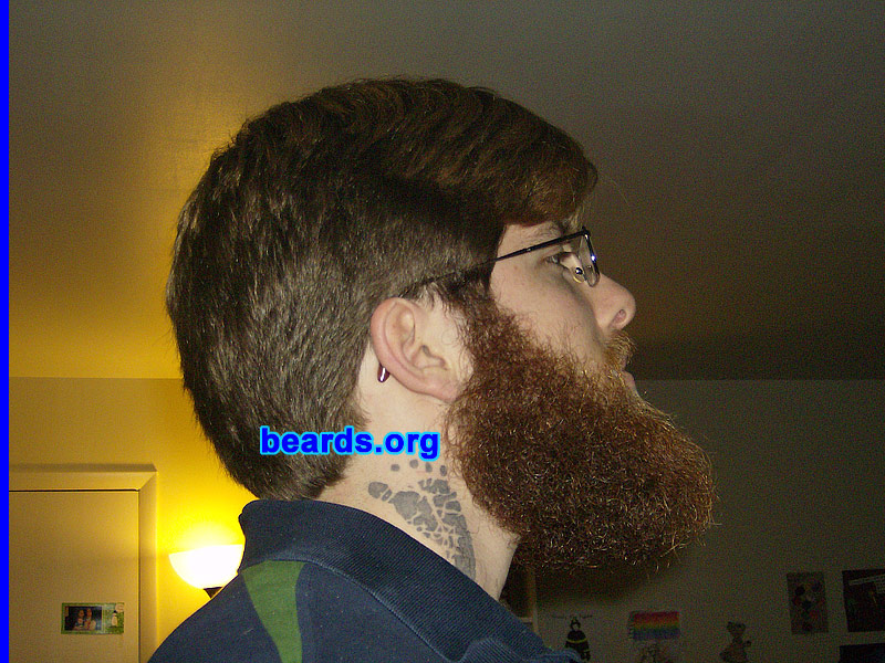 Brandon S.
Bearded since: 2000.  I am a dedicated, permanent beard grower.

Comments:
As a youth, I looked forward to the day when I could grow facial hair. My father had a large, full beard when I was a baby and I always admired the pictures of his bearded face hanging in our home. He would change his beard style often and I was amazed at how different he appeared with each new look. 

I started out with sideburns and a goatee. At sixteen years old, I returned from a fifteen-day backpacking trip with my first full beard and fell in love! Ever since then I've experimented with various styles. The full beard is still my favorite.

The beard in these pictures was grown for a beard competition between me and five other friends. We all put $20 in to see who could go the longest without shaving. I documented my growth on a semi-weekly/monthly basis. After seven months, I was victorious. I'm seen in one of these shots with the $120 my beard and I won! 

With much regret, I shaved my award-winning beard for a job. Now I'm laid off and am a month into my "Unemployment Beard". This time, I'm determined to hit the one year mark.

How do I feel about my beard? I love my beard! It's nice and full and has many different colors in it. I feel privileged to own such a fine piece of masculinity.
Keywords: full_beard