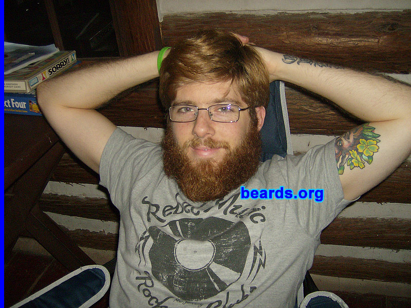 Brandon S.
Bearded since: 2000.  I am a dedicated, permanent beard grower.

Comments:
As a youth, I looked forward to the day when I could grow facial hair. My father had a large, full beard when I was a baby and I always admired the pictures of his bearded face hanging in our home. He would change his beard style often and I was amazed at how different he appeared with each new look. 

I started out with sideburns and a goatee. At sixteen years old, I returned from a fifteen-day backpacking trip with my first full beard and fell in love! Ever since then I've experimented with various styles. The full beard is still my favorite.

The beard in these pictures was grown for a beard competition between me and five other friends. We all put $20 in to see who could go the longest without shaving. I documented my growth on a semi-weekly/monthly basis. After seven months, I was victorious. I'm seen in one of these shots with the $120 my beard and I won! 

With much regret, I shaved my award-winning beard for a job. Now I'm laid off and am a month into my "Unemployment Beard". This time, I'm determined to hit the one year mark.

How do I feel about my beard? I love my beard! It's nice and full and has many different colors in it. I feel privileged to own such a fine piece of masculinity.
Keywords: full_beard