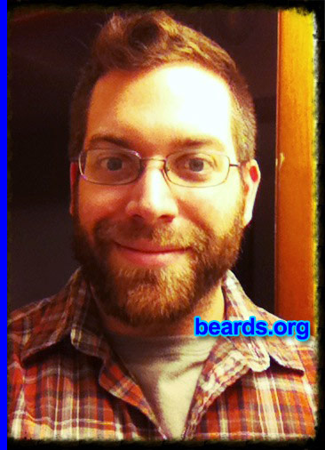 Christian R.
Bearded since: 2014. I am an experimental beard grower.

Comments:
Why did I grow my beard? Participated in NO SHAVE NOVEMBER and shaved December 1st. All the woman I work with said I was the only guy who looked good at the end of the month and were disappointed that I shaved. I decided to start growing again about a week later, as a first attempt to grow a beard. It is an experiment for now, since I have never been able to grow a beard before due to working in the security sector and in law enforcement where strict shaving policies where in place. My new job has none of that garbage in place!

How do I feel about my beard? So far I like it and get many compliments from males and females alike. I have found it is more fun to wash and comb than it is to shave.
Keywords: full_beard