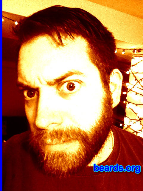 Christian R.
Bearded since: 2014. I am an experimental beard grower.

Comments:
Why did I grow my beard? Participated in NO SHAVE NOVEMBER and shaved December 1st. All the woman I work with said I was the only guy who looked good at the end of the month and were disappointed that I shaved. I decided to start growing again about a week later, as a first attempt to grow a beard. It is an experiment for now, since I have never been able to grow a beard before due to working in the security sector and in law enforcement where strict shaving policies where in place. My new job has none of that garbage in place!

How do I feel about my beard? So far I like it and get many compliments from males and females alike. I have found it is more fun to wash and comb than it is to shave.
Keywords: full_beard