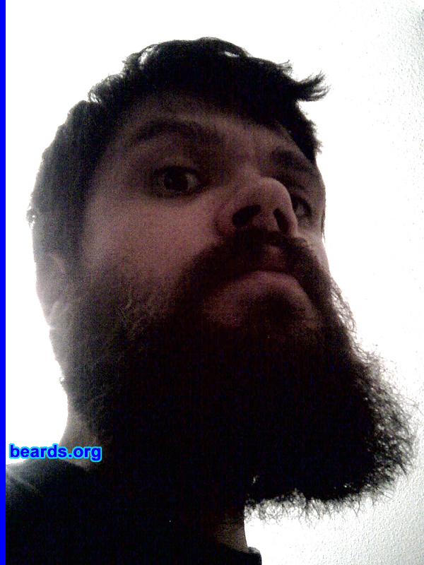 Geo R.
Bearded since: 2006.  I am a dedicated, permanent beard grower.

Comments:
Originally I just didn't want to shave, avoiding it for several weeks. Then it turned into an experiment, and after about three or four months I was hooked. Now I'm bearded for life!

How do I feel about my beard?  I wish my facial hair would grow in a more uniform fashion, and that it were a bit fuller.  But I also like the challenge of patience it requires to find out the right beard style for me.
Keywords: full_beard
