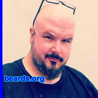 Greg B.
Bearded since: 2002. I am a dedicated, permanent beard grower.

Comments:
I grew my beard because I have a bit of a baby face and I look older with a beard.  I just like the way it feels.

How do I feel about my beard? I feel like it's not full enough...it's too sparse.  I love the "devil's point" on my chin. I love that it's going gray.
Keywords: full_beard