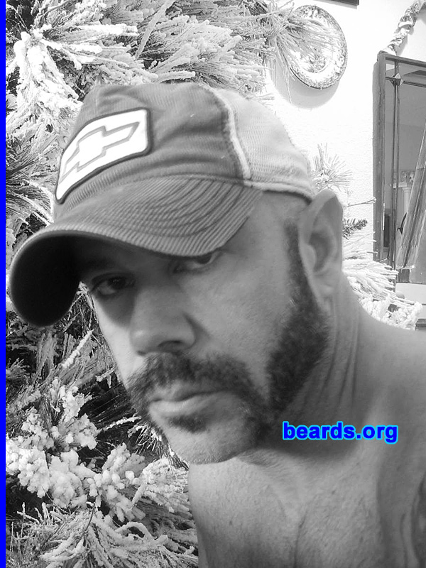 Huck N.
Bearded since:  2002.  I am a dedicated, permanent beard grower.

Comments:
I grew my beard for status.

How do I feel about my beard?  He has a personality all his own.
Keywords: soul_patch mutton_chops