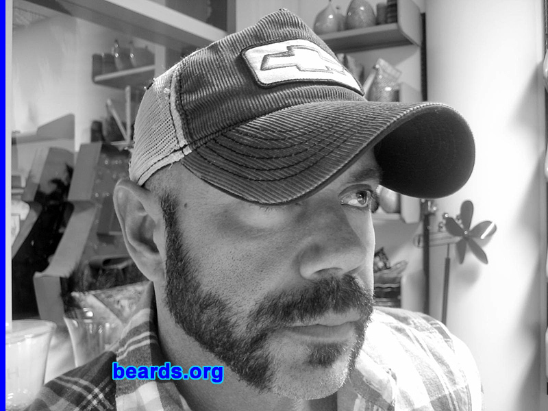 Huck N.
Bearded since:  2002.  I am a dedicated, permanent beard grower.

Comments:
I grew my beard for status.

How do I feel about my beard?  He has a personality all his own.
Keywords: soul_patch mutton_chops