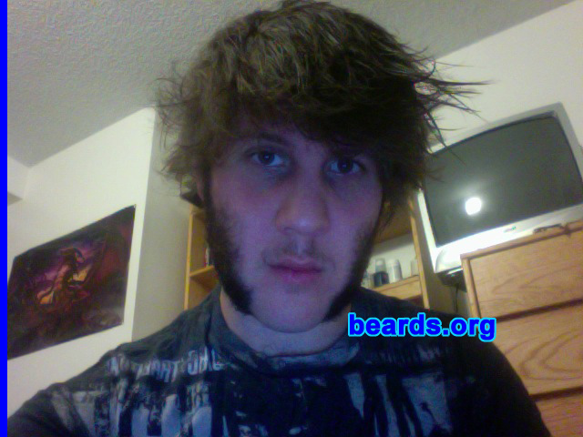 Jared M.
Bearded since: 2008.  I am an experimental beard grower.

Comments:
I grew my beard during No-Shave November or Beardvember as some like to call it. I have had beards previously, but this is my new beard. I plan to continue the beard into something fun and interesting, possibly historical.

How do I feel about my beard?  I love my beard deeply and would feel at loss if I had to shave it. I am an avid beardsman, fascinated by the history and culture of beards.
Keywords: mutton_chops