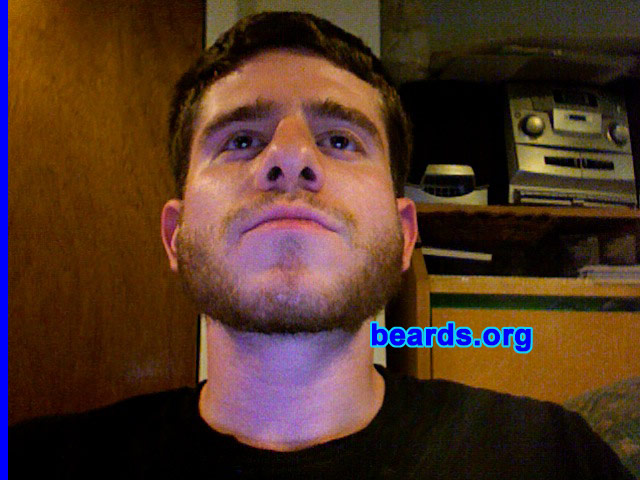 Lawrence
Bearded since: 2010.  I am an experimental beard grower.

Comments:
I am twenty-two. I tried going without shaving for several days at at time during my very early twenties and did not like the appearance of the facial hair.  It looked patchy. This time, however, I really made the commitment and it seems to be improving. This is after six weeks of growth and having it trimmed close by the barber three weeks ago. I am just giving it a try since this is my first beard.

How do I feel about my beard? It's really starting to grow on me, literally and figuratively. It seems to really define my laid-back nature.
Keywords: full_beard