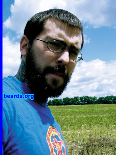 Andrew B.
Bearded since: 2008.  I am an experimental beard grower.

Comments:
I'm in the process of trying to obtain an eight- to twelve-inch beard, mainly to hide my baby face.

How do I feel about my beard?  I wish that it were fuller in spots. But on a positive note, I do enjoy the richness of color.
Keywords: full_beard