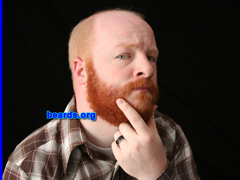 Aaron
Bearded since: 2005. I am a dedicated, permanent beard grower.

Comments:
Why did I grow my beard? I started balding and now have a shaved head. This lead me to experiment with my beard, and now I love it. It's God's way of saying, "Hey, sorry about the baldness. Here, have some facial hair."

How do I feel about my beard? I am proud to have a ginger beard. I love the deep red of it. I am looking to grow it better and looking for a style that will fit well with my personality and shape.
Keywords: full_beard