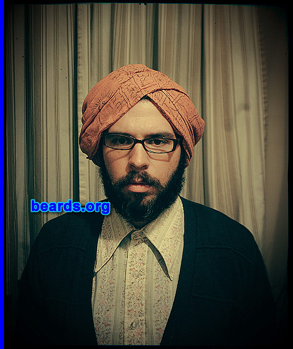 Ian S.
Bearded since: 2012. I am an occasional or seasonal beard grower.

Comments:
Why did I grow my beard? I grew the beard as a symbol of power and manliness. It also goes well with my turban and trucker hats.

How do I feel about my beard? It's a delicate dance of beauty and masculinity that commands respect. 
Keywords: full_beard