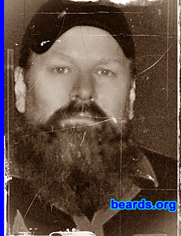 Mike
Bearded since: 2000.  I am a dedicated, permanent beard grower.

Comments:
I started with a goatee in 2000 and it's developed from there. Many of my current neighbors are Amish and I allowed my goatee to evolve to a "goatee grande", then to a full beard. I've always like the way beards looked, especially in Civil War photos. I'm a re-enactor, too.  So it helps complete the look.

How do I feel about my beard? I love it. I recently trimmed it a little and for the month you'd have thought my best friend died. I hated how the trim turned out. However, it does generate a good deal of fear and hate, in certain company, especially in bankers and corporate types. My latest girlfriend really likes it, though. She told me to NEVER completely shave it off as it tickles her...fancy. Ahem.
Keywords: goatee_mustache