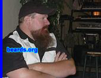 Mike
Bearded since: 2000.  I am a dedicated, permanent beard grower.

Comments:
I started with a goatee in 2000 and it's developed from there. Many of my current neighbors are Amish and I allowed my goatee to evolve to a "goatee grande", then to a full beard. I've always like the way beards looked, especially in Civil War photos. I'm a re-enactor, too.  So it helps complete the look.

How do I feel about my beard? I love it. I recently trimmed it a little and for the month you'd have thought my best friend died. I hated how the trim turned out. However, it does generate a good deal of fear and hate, in certain company, especially in bankers and corporate types. My latest girlfriend really likes it, though. She told me to NEVER completely shave it off as it tickles her...fancy. Ahem.
Keywords: goatee_mustache