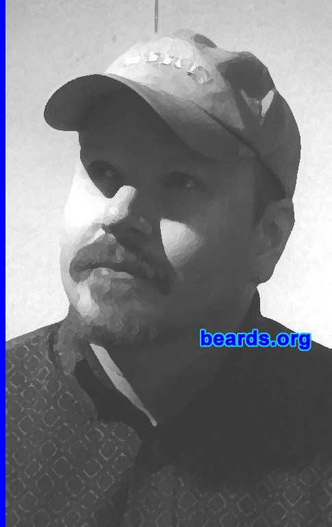 Mike
Bearded since: 2000.  I am a dedicated, permanent beard grower.

Comments:
I started with a goatee in 2000 and it's developed from there. Many of my current neighbors are Amish and I allowed my goatee to evolve to a "goatee grande", then to a full beard. I've always like the way beards looked, especially in Civil War photos. I'm a re-enactor, too.  So it helps complete the look.

How do I feel about my beard? I love it. I recently trimmed it a little and for the month you'd have thought my best friend died. I hated how the trim turned out. However, it does generate a good deal of fear and hate, in certain company, especially in bankers and corporate types. My latest girlfriend really likes it, though. She told me to NEVER completely shave it off as it tickles her...fancy. Ahem.
Keywords: goatee_mustache