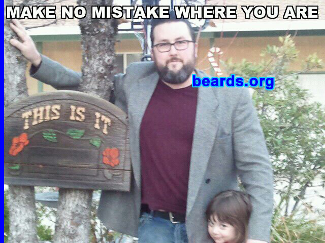 Jess G.
Bearded since: 1994. I am a dedicated, permanent beard grower.

Comments:
Why did I grow my beard? Well, real beard? I started growing a goatee in high school, because it was the 1990s, and I could. Didn't stick with it, though.  Through my twenties I couldn't grow much of a mustache, so I stuck with sideburns at most. Until last year. I got a weird growth on my chin, and my doctor prescribed me a medical beard, in lieu of surgery! Have shaved it off once, but I went right back. Might be here to stay.

How do I feel about my beard? There are a number of reasons I feel like my beard is natural. I come from hardy Viking stock, so there's that. My father has worn a beard for most of my life, and he's a handsome feller. I'm a novelist, so the beard seems like a fitting addition. Throw on a tweed jacket and sport a (purely cosmetic) pipe, I'm looking like some sort of professor from a science fiction movie! Seriously, once I realized that my beard was coming in gray, I felt much more in touch with myself as a mature man, a father, and citizen of the world.
Keywords: full_beard