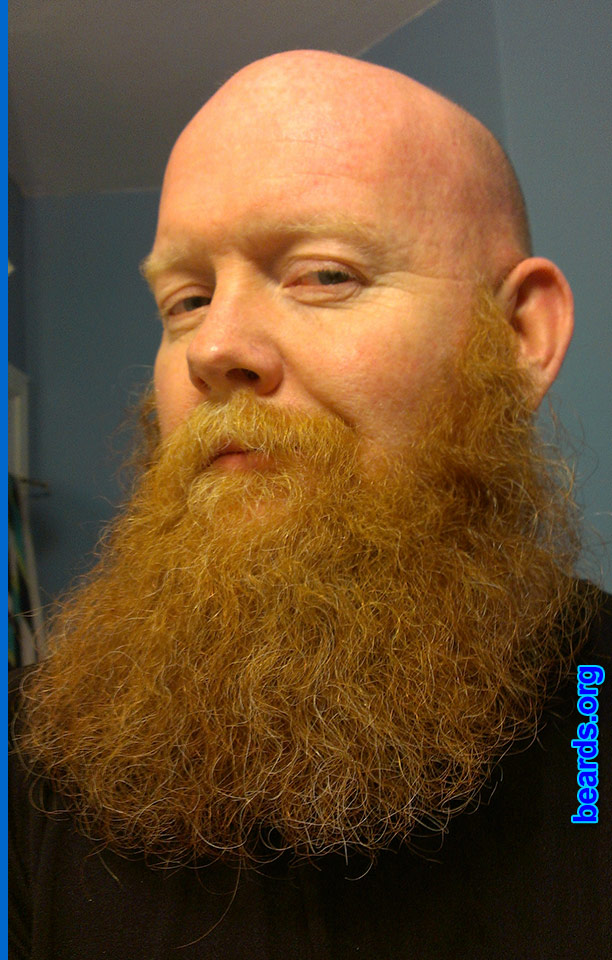 J.R.M.
Bearded since: 2010.

Comments:
Why did I grow my beard? I am a permanent dedicated beard grower. I started with a goatee in 1994, but became a full beard guy in 2010. Beards are a naturally occurring feature on most men's faces. Why shave such an amazing work of nature?

How do I feel about my beard? It's an inseparable part of who I am.
Keywords: full_beard