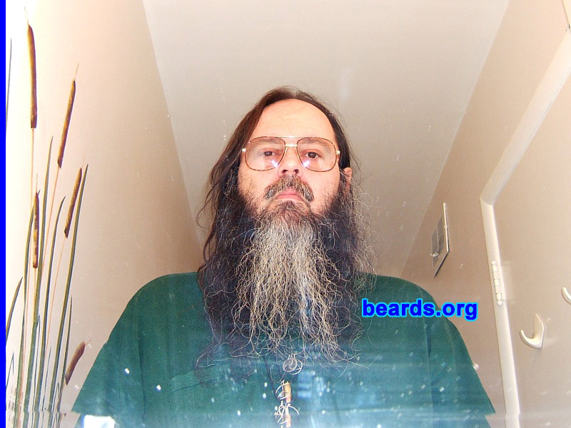 Vance L.
Bearded since: 2000.  I am a dedicated, permanent beard grower.

Comments:
I had to be clean shaven during four years in the Army. Except for that time, I have had a beard from the age of fifteen. 

Why? I didn't grow it. It grows on its own! I find that these days it is a most effective filter -- it screens out the judgmental.

How do I feel about my beard?  It is natural. I think it "just looks right" it "belongs". And besides, it gives your hands something to do while thinking deeply. It has become part of who and what I am.
Keywords: full_beard