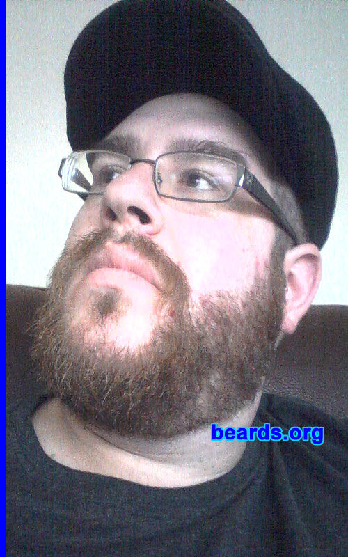 Adam S.
Bearded since: 2001. I am a dedicated, permanent beard grower.

Comments:
I've always liked the look of full beards, ever since growing up with my dad (whose beard was pretty impressive in his younger days), and this winter was a bad one, so I decided to take the plunge!

How do I feel about my beard? I feel it's been a long time coming. I've always had facial hair in some capacity since graduating high school in 1999, but it took a while to finally grow all in (my moustache and upper chin especially). Looking at it now, I feel it's a respectable looking beard; not too sparse but not too insane. It completes my look as a person, in my opinion.
Keywords: full_beard