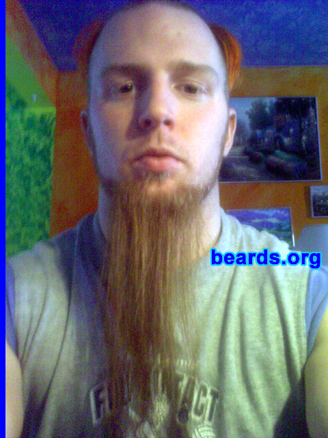 Jason McComsey
Bearded since: 2002.  I am a dedicated, permanent beard grower.

Comments:
I grew my beard because I went to Catholic school where I had to shave every day.  Then I switched to public school and used that opportunity to grow my beard and haven't cut it since, other than to trim it and level the ends.

How do I feel about my beard?  My beard will never be cut unless my health depends on it.  It has been through three long-term relationships and about five years of a nagging mother.
Keywords: chin_curtain