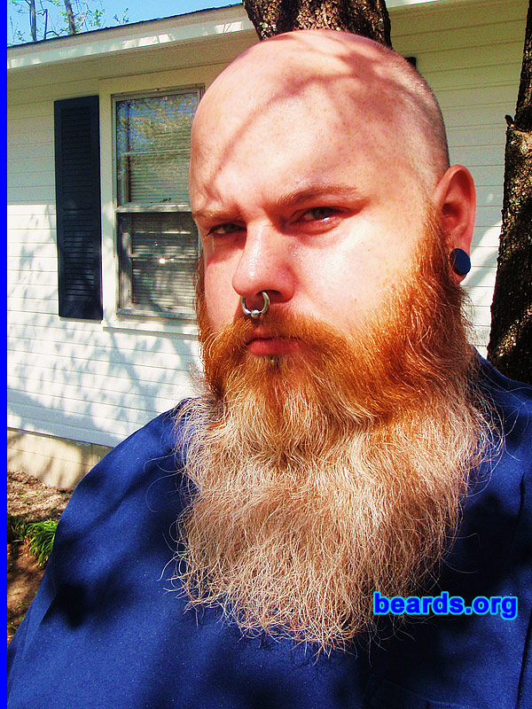 Chris N.
Bearded since: 1993. I am a dedicated, permanent beard grower.

Comments:
I've had a beard of some sort since I was seventeen years old. My current beard, I've been growing for about nine months. I've wanted to grow it out for years but would always have a trim mishap or just grow tired of the middle-phase look. I had a good start twice now on a full beard, but welding accidents have taken them both times....cutting torches and beards do not mix, by the way. After fixing said problems, the beard that I have now is great.

How do I feel about my beard? I love my beard and get lots of reactions from people, both good and bad. I plan on growing my beard 'til it just wont grow anymore.
Keywords: full_beard