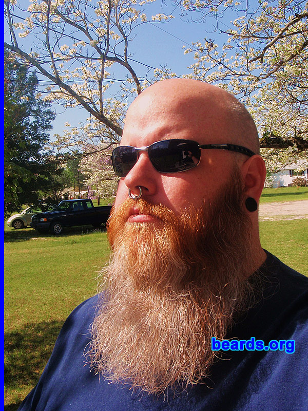 Chris N.
Bearded since: 1993. I am a dedicated, permanent beard grower.

Comments:
I've had a beard of some sort since I was seventeen years old. My current beard, I've been growing for about nine months. I've wanted to grow it out for years but would always have a trim mishap or just grow tired of the middle-phase look. I had a good start twice now on a full beard, but welding accidents have taken them both times....cutting torches and beards do not mix, by the way. After fixing said problems, the beard that I have now is great.

How do I feel about my beard? I love my beard and get lots of reactions from people, both good and bad. I plan on growing my beard 'til it just wont grow anymore.
Keywords: full_beard