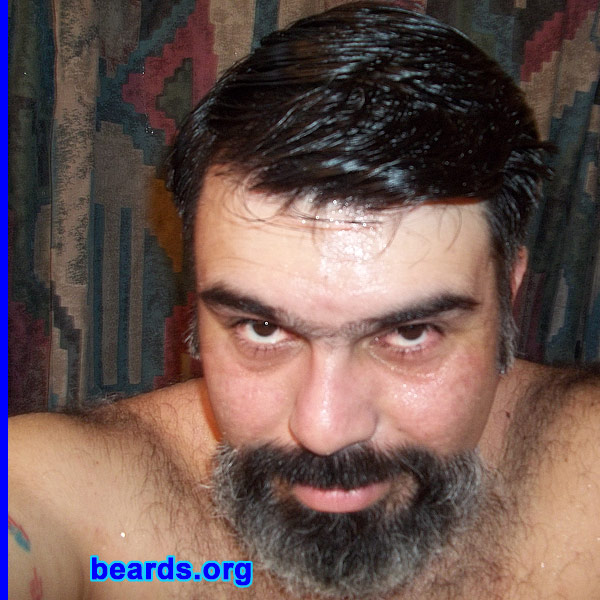 Markos D.
Bearded since: 2009. I am a dedicated, permanent beard grower.

Comments:
I grew my beard because I really like the look of it on me and the feel of it too.

How do I feel about my beard? I love it a lot.
Keywords: goatee_mustache
