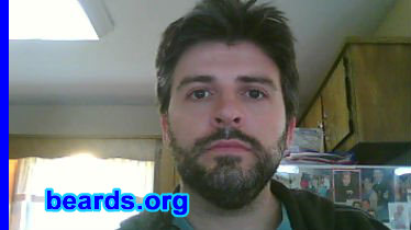 Chris
Bearded since: March 2009. I am an experimental beard grower.

Comments:
I grew my beard because I wanted a change.

How do I feel about my beard? Love it. Wonderful, masculine thing...
I like it. So does my family. 
Keywords: full_beard