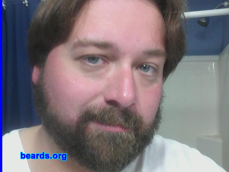 Chris S.
Bearded since: 2012. I am a dedicated, permanent beard grower.

Comments:
Why did I grow my beard? Time for a change,  I had had a goatee and mustache since I was seventeen or so. Thought it was time to run with the big dogs. Fiance loves it and so do I. I have gotten so many compliments. I'm a big guy, So I think i pull it off quite well.  See no reason to shave again.

How do I feel about my beard? I love it!!!! I can't believe it didn't do this sooner. I never really had the patience for it to get thick before. But I'm older and wiser now. So I let it grow. The beard is the way to go!
Keywords: full_beard