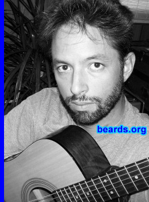 Rob Seibert
Bearded since: 1995.  I am a dedicated, permanent beard grower.

Comments:
I grew my beard because I look much better with a beard. I also do not like having to shave. My beard is as thick as nails, and you can hide stuff in it. Without a beard, my face looks too feminine. I appear sick or emaciated without a beard. When humankind was created, beards came with the package. It is unnatural to shave it off. In Hebrew culture, only pagan idolaters would shave or trim their beards. Shaving for the purpose of vanity goes against the Torah, where it states "do not mar the edges of the beard" and "do not round the hair at the temples".

How do I feel about my beard? I love my beard, and prefer to have a full, completely untrimmed and unshaven beard. I prefer to have an Orthodox Jewish style beard, but my job requires I keep it short. Presently, I am using a little chutzpah, and just going for it. I have not shaved in two weeks, and I don't plan on shaving for a long time, if not forever. I can keep the length trimmed with scissors, but that's about it. Awhile back, in the year 2000, I was living in a hippie commune, and I was able to let all my hair grow for an entire year. I looked great! I would love to have a job that doesn't discriminate against beards...
Keywords: full_beard