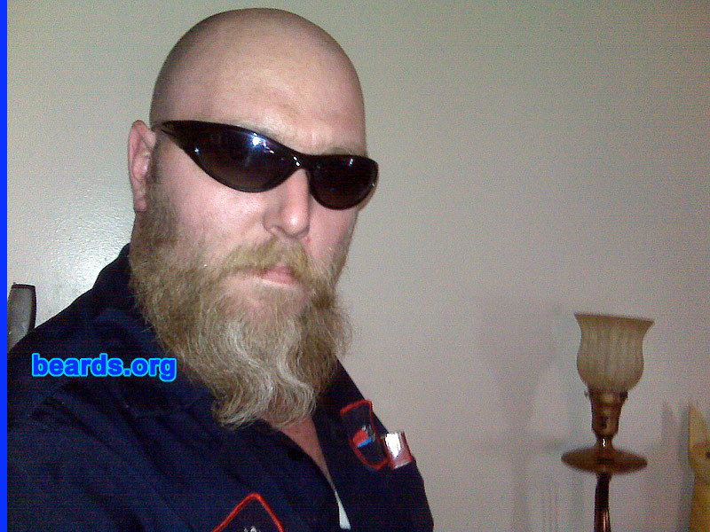 Ronnie K.
Bearded since: 1995.  I am a dedicated, permanent beard grower.

Comments:
I grew my beard because I've always been lazy about shaving, even in middle school when it first started to sprout. I've been sporting a full beard now for a couple of years and my wife loves it. It's become a trademark that people identify me with now. I keep it clean and combed and I have something to be proud of. A lot of young men ask me about what it took to grow it and I just say "patience".

How do I feel about my beard? I love my beard. I like the feel of it on my face when the wind blows it. It's a feeling only someone with a long beard would know. I survived all those unpleasant phases of the beard and got rewarded for my patience.
Keywords: full_beard