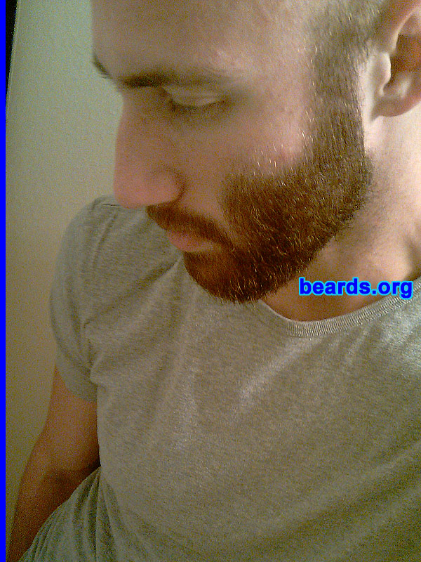 B.H.
B.H.
Bearded since: 2010. I am a dedicated, permanent beard grower.

Comments:
I grew a beard simply because I had grown almost everything else since I was eighteen. It was predestined actually. I have extremely sensitive skin; terrible breakouts and razor burn if a razor even touched my face, bad for days upon end. I have had to use an electric razor ever since I discovered this. I became lazier as time went on and kept going longer without trimming my facial hair. Eventually it had been two weeks (oops!) and one of my colleagues said I looked great with a beard. I thought, might as well try. So I did. I kept it for six weeks and liked it well enough, nothing amazing. I shaved it off due to boredom, yet soon realized I missed it! I felt different suddenly, like I was missing something, my beard! I soon came to realize it was meant to be. I needed a beard again. I began growing it eight weeks ago and grow even more in love with it daily. I am certainly a dedicated beard man now.

How do I feel about my beard? I feel like my beard is supposed to be there. I adore it and love taking care of it. Since I can't have hair on my head, it is really great to have it on my face. One of the highlights of my year, discovering this fact. I plan on growing my beard fuller and longer. I will see where it goes from there.

UPDATE: After having to shave for a project, I started growing the beard again.  This photo is at day forty-six of the new growth.
Keywords: full_beard