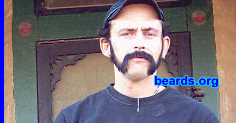 Jason Ingram
Bearded since: 1989.  I am an occasional or seasonal beard grower.

Comments:
I grew my beard because I like how it looks.

How do I feel about my beard?  I'd be naked without it.
Keywords: mutton_chops