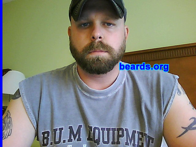 Jim
Bearded since: 2007.  I am a dedicated, permanent beard grower.

Comments:
I served in the military for six years in which I had to shave every day. When I got out, I became obsessed with the beard.

How do I feel about my beard?  I like my beard. I feel more confident with it than without it. My wife likes it trimmed short, but I prefer the longer look.
Keywords: full_beard Jim_feature