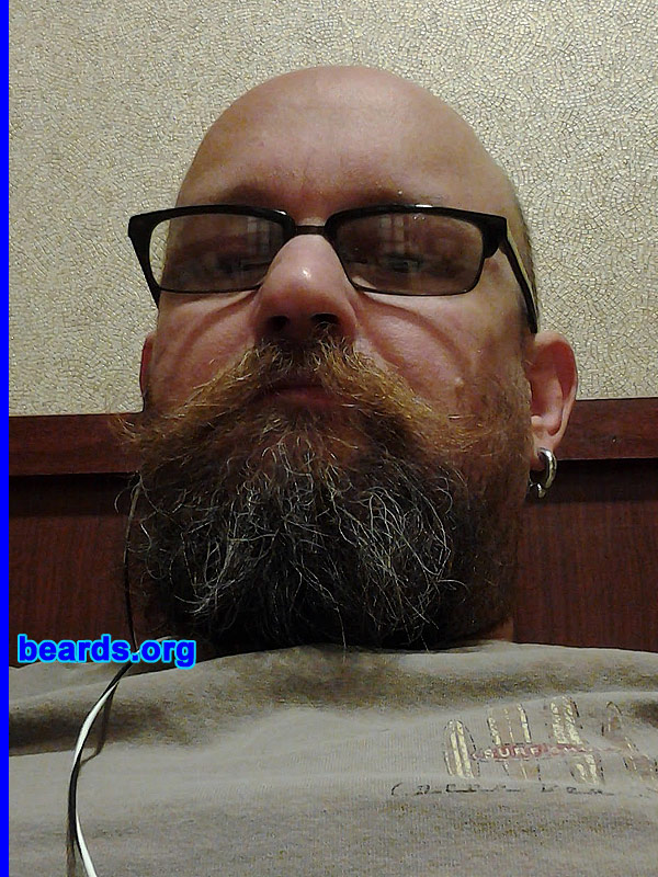 Justin A.
Bearded since: 1997. I am a dedicated, permanent beard grower.

Comments:
I grew my beard because I've always admired them and I've wanted to grow one from a young age.

How do I feel about my beard? I wish it were thicker and either more red or pure white. It's more wild than I'd like. I wish it grew more straight, or, conversely, I think it would also be better if it grew in tight curls.
Keywords: full_beard