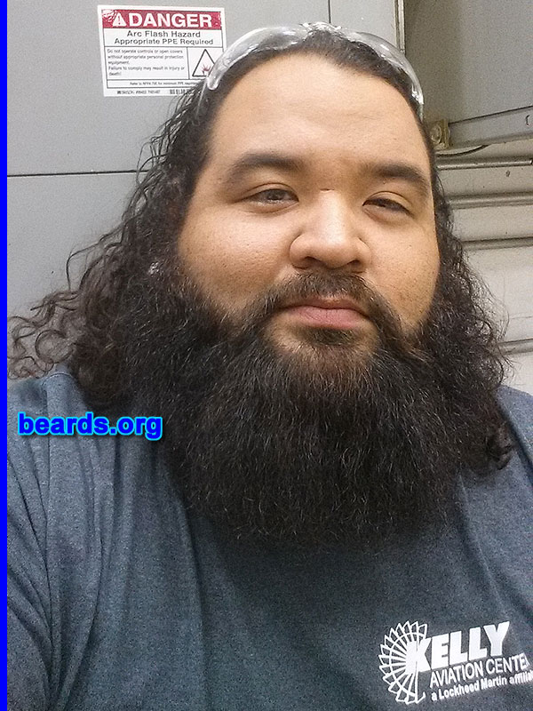 Joshua L.
Bearded since: 2002. I am an occasional or seasonal beard grower.

Comments:
Why did I grow my beard? I'm twenty-eight years old. I have not had a clean shaven face since I was seventeen. My facial hair has changed from goatee to chin strap to full beard. Either way, I always end up choosing a full beard or something close to it. I've been growing my beard with only a few minor trims since October 2012. No matter what ,the beard always goes noticed.

How do I feel about my beard? I'm trying to get close to a year with having my beard without cutting it off. I'm happy with the results and I am constantly trying to take care of it. I love my beard. Plus, plenty of females stop me to touch my beard.  So that's awesome as well.
Keywords: full_beard