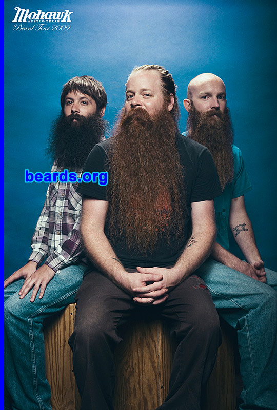 Moody
Bearded since: 2005.  I am a dedicated, permanent beard grower.

Comments:
This is actually a photo of three bearded warriors that are attending the World Beard and Moustache Championships in Anchorage this year. They are representing Austin, Texas with super sweet and gnarly beards.

How do I feel about my beard?  I feel that my beard insulates my face, provides  protection, and intimidates enemies, much like the lone mountain wolf of the great rift valley.
Keywords: full_beard