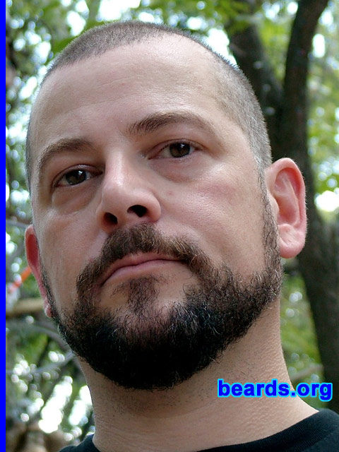 Scott
Bearded since: 2004.  I am a dedicated, permanent beard grower.

Comments:
I had a shaved head and a goatee for over ten years and, essentially, I became tired of shaving.  Never having grown a full beard before, I simply decided to let it grow to see how it looked.

I love it; I wish I had grown a full beard years ago! I recently had to shave it down to the goatee again for the recent run of The Rocky Horror Show at the Zachary Scott Theatre Center here in Austin, TX.  As soon as the six-week run ended, I stopped shaving and my beard is coming back in nicely.
Keywords: full_beard