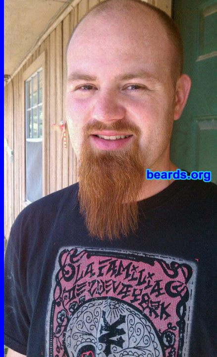 Will H.
Bearded since: 2011. I am a dedicated, permanent beard grower.

Comments:
I started out with a baby face, but as I got older and lost my hair I thought I would make up for it with a goatee. Last year my wife and I were joking around about me growing a full beard like my dad since I was on vacation.  So about eight months ago I started and haven't stopped. We went through a few stages of long goatee, short full beard, etc. but people love the red and how big it is and we are always drawing attention, especially since we live in a small country town. It's always funny when people ask if I wash it and it's usually always the first thing someone asks about when they meet me. It's been an ongoing joke at my job and with family, but I am seeing just how long I can get it.

How do I feel about my beard? I love my beard full. At times it itches and drives me crazy, but overall I like having it. With age I am looking more and more like my dad, who also has a full beard, but only during certain months. I enjoy that it makes me stand out in a crowd and different than everyone else.
Keywords: goatee_mustache