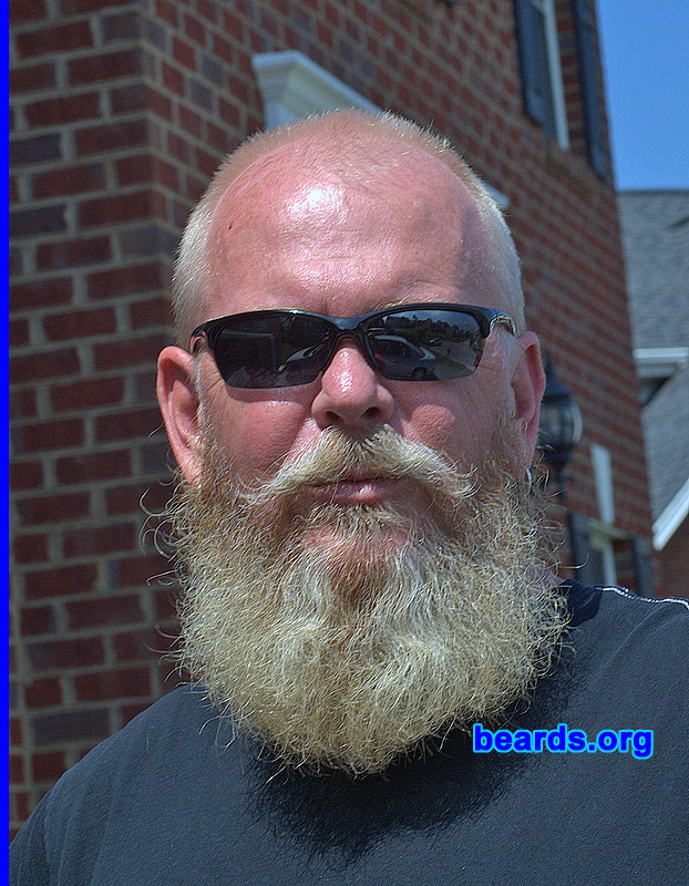 Johnnie P.
Bearded since: 2010. I am a dedicated, permanent beard grower.

Comments:
My beard started out as a bet with the wife. Now I have become attached and plan to keep it permanent.

How do I feel about my beard? LOVE IT! 
Keywords: full_beard