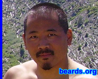 George
Bearded since: 2003.  I am a dedicated, permanent beard grower.

Comments:
I just let it grow.  I knew I wouldn't have a full beard or even a goatee, but let it grow in to see if I could work with what was there. I just trim a few whiskers under my lower lip and keep the chin part symmetrical and decided that this was my look.  It's been three years now and have kept it pretty much this way the whole time.

I like it.  It's different from other types of facial hair.   I think other people may have a difficult time getting used to it. Its not easy to classify. Any ideas of what to call it? 
Keywords: goatee_mustache
