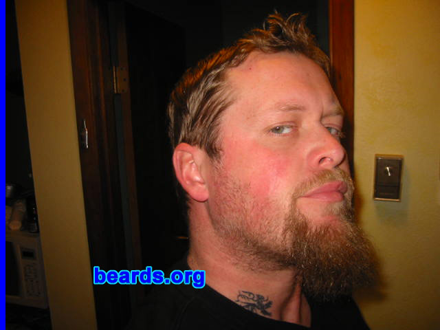 Grim Thompson
Bearded since: 1991.  I am a dedicated, permanent beard grower.

Comments:
Had a goatee since high school. I've grown it out before, but decided to go long now. Gonna let it go!

How do I feel about my beard?  Being of Viking/Scottish descent, having the beard is kind of a link to the past for me. I don't want to be another Joe-Schmoe, blend-in. I like the individuality of beards/moustaches/goatees. It's a form of expression, and I'm always admiring what others do. It's like a brotherhood (laughing).
Keywords: goatee_mustache