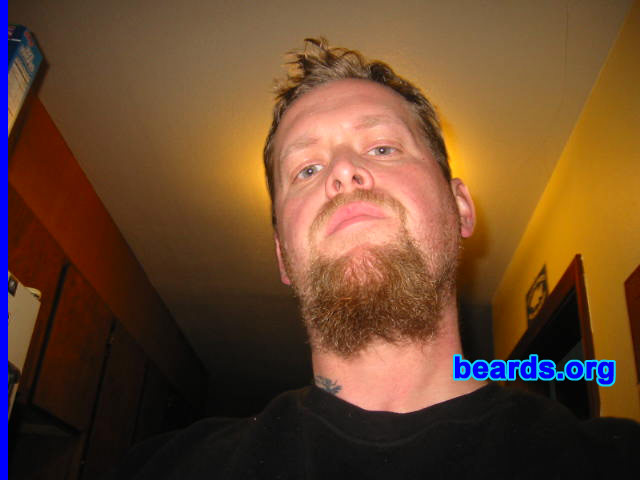 Grim Thompson
Bearded since: 1991.  I am a dedicated, permanent beard grower.

Comments:
Had a goatee since high school. I've grown it out before, but decided to go long now. Gonna let it go!

How do I feel about my beard?  Being of Viking/Scottish descent, having the beard is kind of a link to the past for me. I don't want to be another Joe-Schmoe, blend-in. I like the individuality of beards/moustaches/goatees. It's a form of expression, and I'm always admiring what others do. It's like a brotherhood (laughing).
Keywords: goatee_mustache