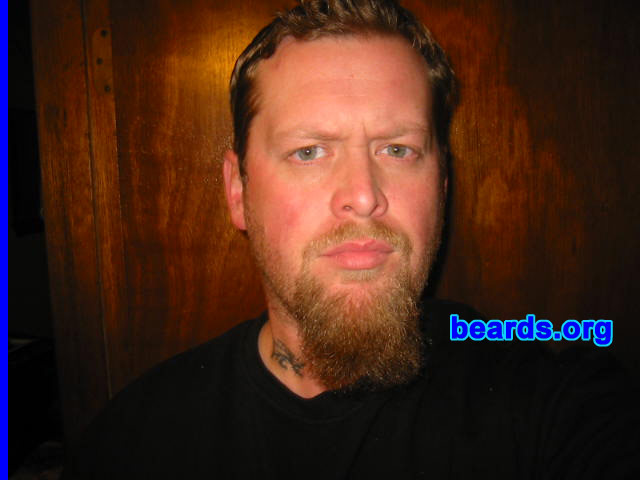 Grim Thompson
Bearded since: 1991.  I am a dedicated, permanent beard grower.

Comments:
Had a goatee since high school. I've grown it out before, but decided to go long now. Gonna let it go!

How do I feel about my beard?  Being of Viking/Scottish descent, having the beard is kind of a link to the past for me. I don't want to be another Joe-Schmoe, blend-in. I like the individuality of beards/moustaches/goatees. It's a form of expression, and I'm always admiring what others do. It's like a brotherhood (laughing).
Keywords: goatee_mustache